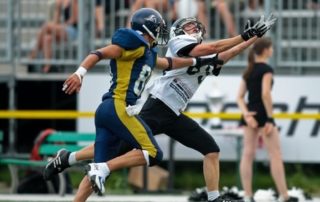 receiver catching a passed football